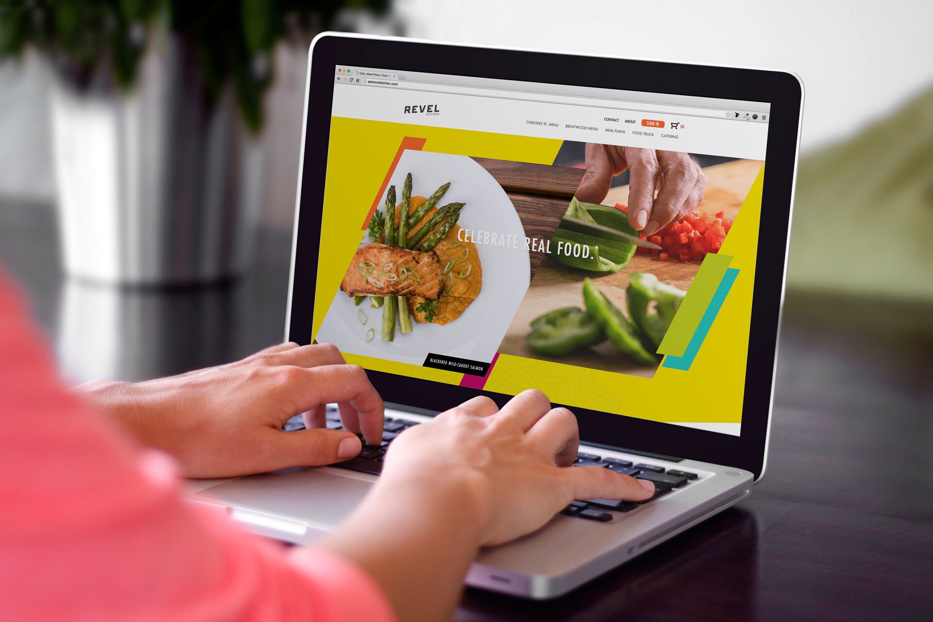 Revel Kitchen website design on laptop