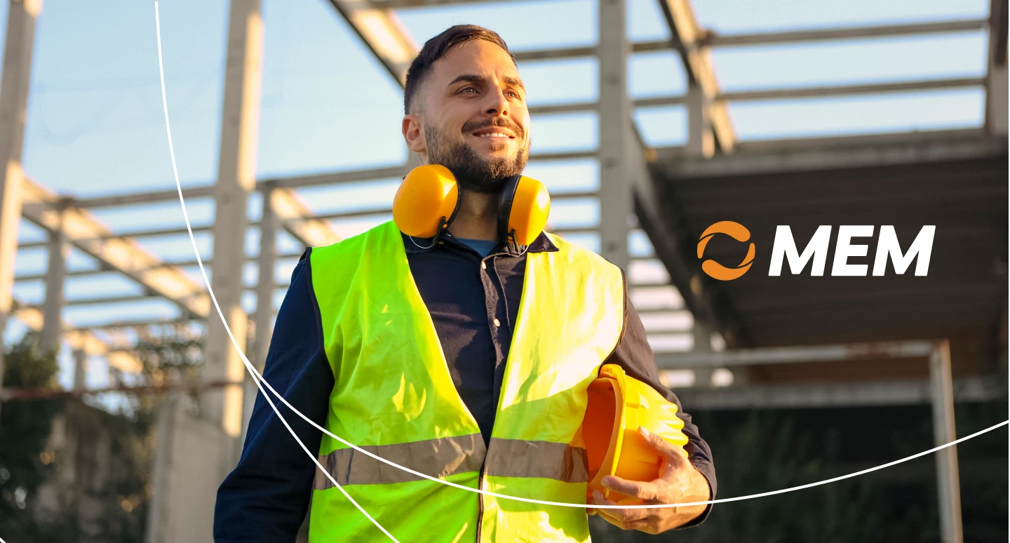 Image of a worker on a construction site with the new MEM logo