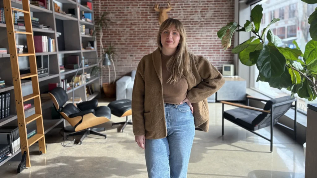 Designer Frances Foster stands in the lobby of Atomicdust in St. Louis