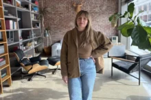 Designer Frances Foster stands in the lobby of Atomicdust in St. Louis