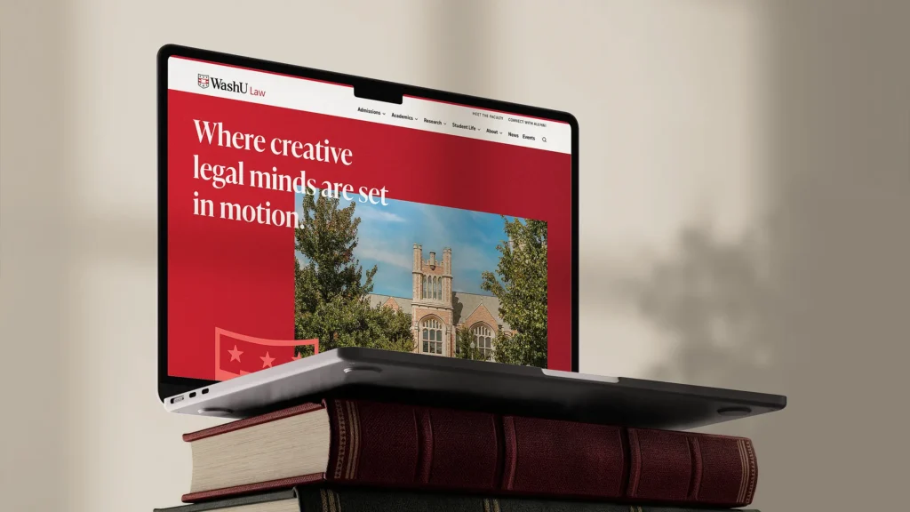 Laptop showing WashU Law university website UX UI refresh of homepage.