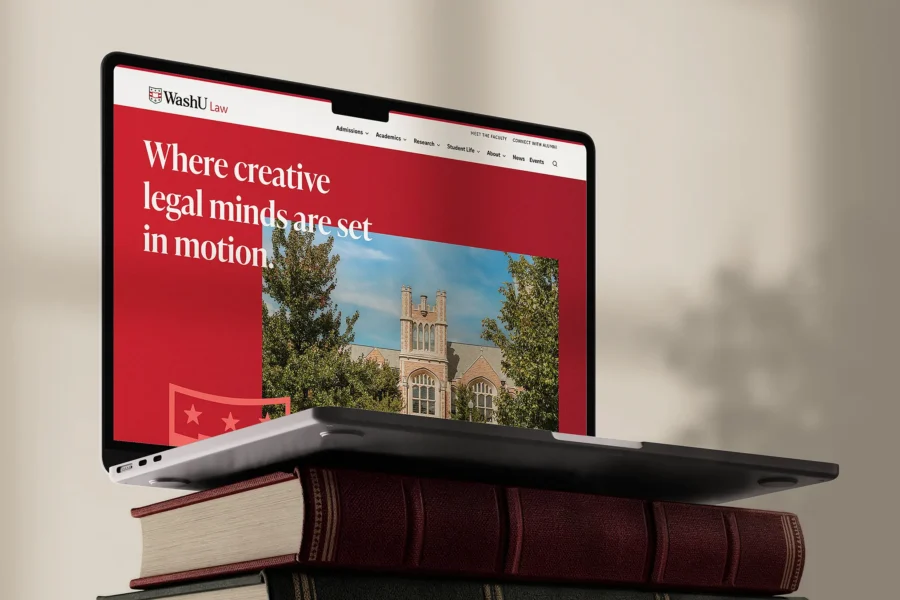 Laptop showing WashU Law university website UX UI refresh of homepage.