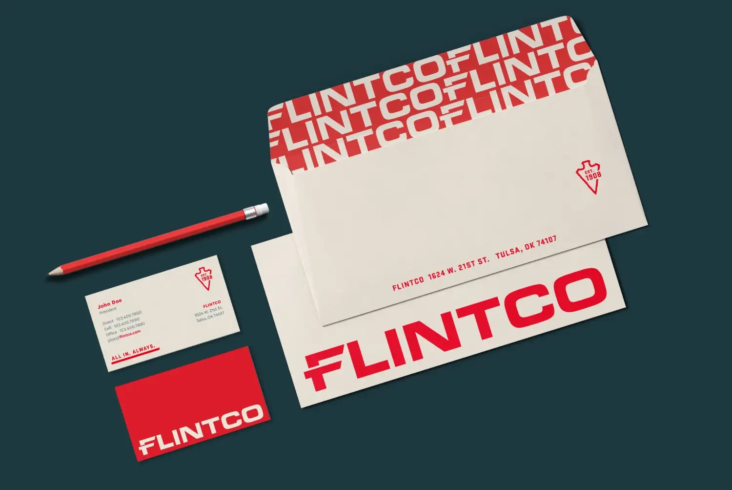 Flintco construction branded print collateral suite including business cards, letterhead and stationery
